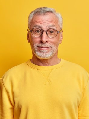 handsome-grey-haired-male-pensioner-has-surprised-cheerful-expression-as-hears-interesting-rumor-or-e1627313563167.jpg